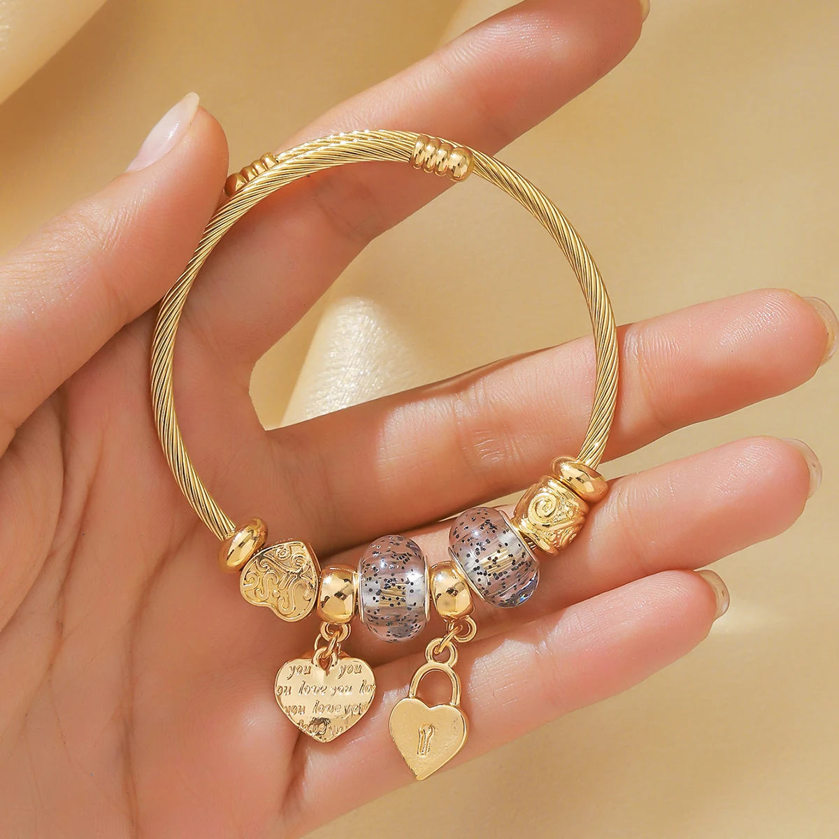Bracelete Multi Elementos Dourado